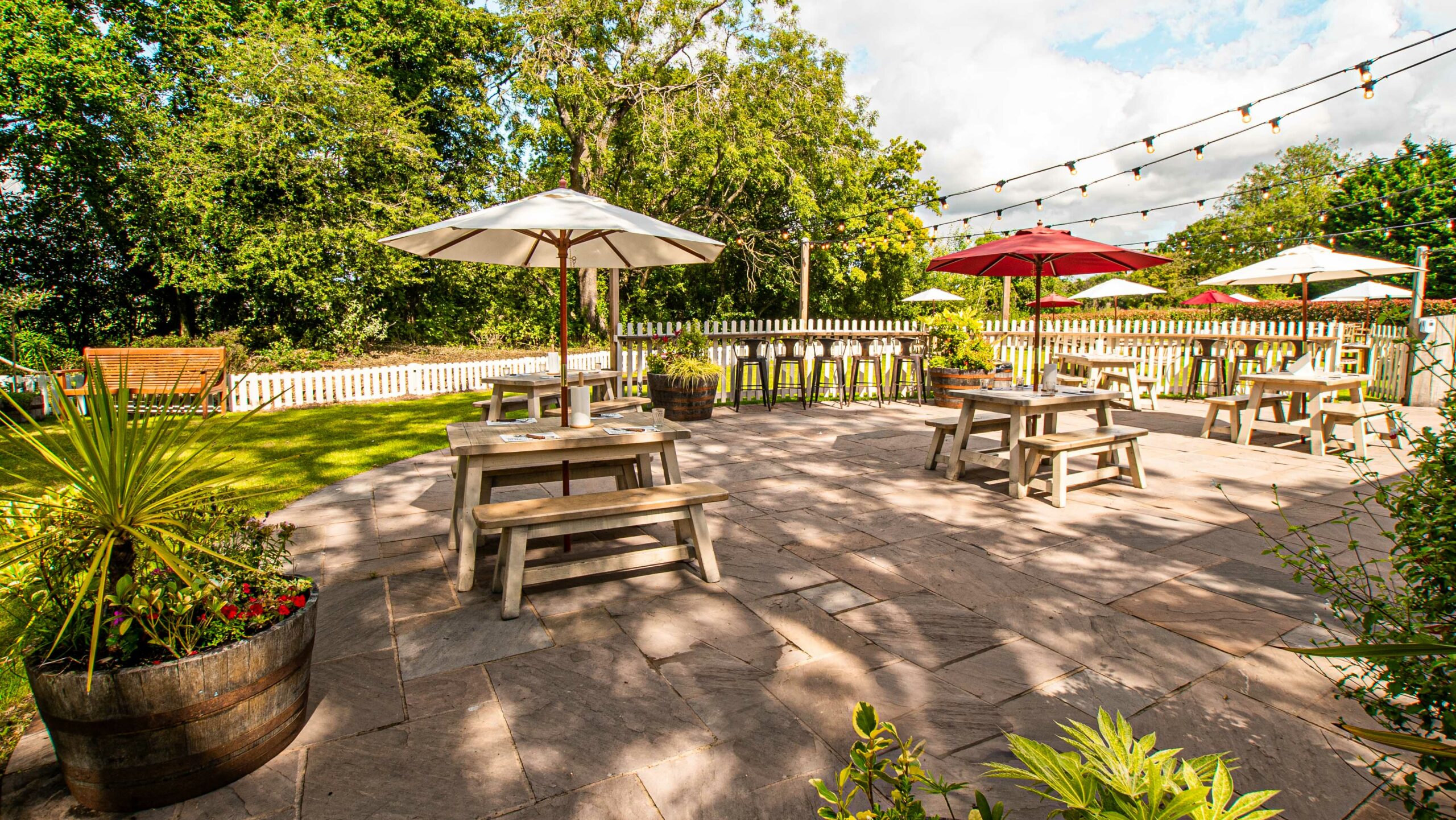 Hickory's Smokehouse Burton green outdoor dining garden area, green space outdoor benches